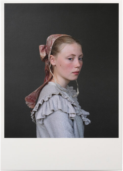 Card with one of Trine Søndergaard's pictures from her exhibition at Skive Museum. The image is a portrait of a young girl wearing a historical garment